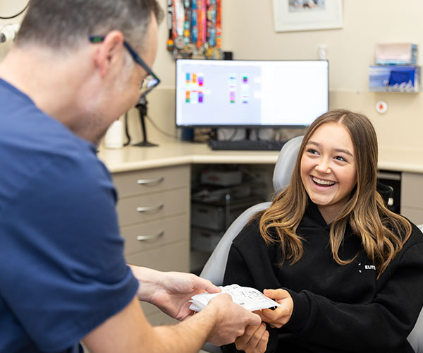 Dr Andre with Happy Patient at The Smile Place